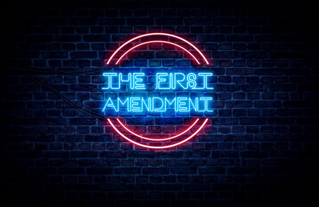 This image has an empty alt attribute; its file name is first-amendment-in-neon-adobe-1-1024x665.jpg